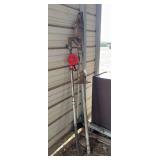 Antigue well pump, hand gas pump bldg:green