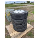 (4) 245/70R19.5 Bridgestone tires on 10 lug pilot wheels, row:5