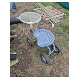 Wheeled garden cart with tractor seat and a little round white table, row:5