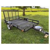 Single axle utility trailer with rear fold down ramp, no title weighs less than 2500 lbs