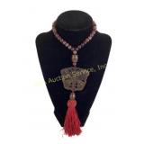 Carved Pendant Necklace with Red Tassel