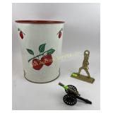 Apple trash can, brass door stop, replica desk