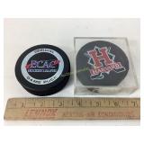 Harvard cased Hockey Puck & Yale Hockey Puck