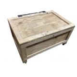 Large wooden crate on wheels