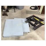 2 folding tables, plastic sawhorses