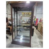 Wood Curio Cabinet With Raised Carved Wood Trim,