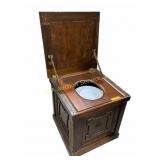 Wooden commode with enamel bucket and lid