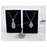 .925 Sterling Silver marked Blue stone pendnats