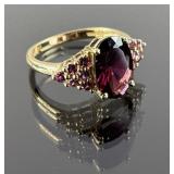14K Gold Ring featuring a Dark Red Gemstone. Total