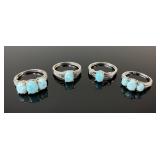 (4) 925 Sterling Silver Rings featuring Blue Gemst