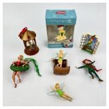 (7) Peter Pan and Tinker Bell Ornaments and one Fi