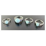 (4) 925 Sterling Silver Rings featuring Blue Gemst