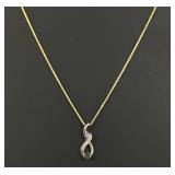 14 Karat Gold Necklace with a Sterling Silver Pend