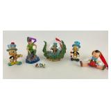 (6) Pinocchio ornaments and a Peter Pan ornament