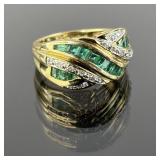 14K Gold Ring featuring Green and Clear Gemstones.