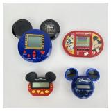 (4) Handheld Disney Electronic Games