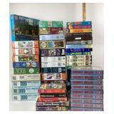Puzzles and VHS Tapes; MASH, Bugs Bunny, Popeye, S