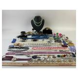 Costume Jewelry: Gold tone charm bracelet, coin