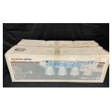 4 bulb Brass and Chrome Lighting fixture in box