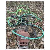Garden decor, bricks, 2 garden hoses