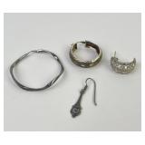 .925 Sterling Silver un matched earrings: Filigree