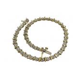10K marked Clear stone tennis style bracelet 6.14g
