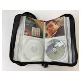 Loose CDs in binder: Featuring Johnny Cash, The Po
