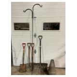 Shovels, birdbath base, garden hook