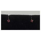 14k gold & ruby earrings. One missing stopper.