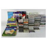 CDs: Kenny Chesney, Whitney Houston, Elton John. B