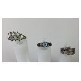 (3) sterling rings with stones sizes 6.76, 7 &