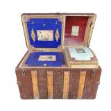 Dome top steamer trunk with decorated tray