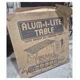 Alum-I-Lite Folding Table 6 Foot With Woodgrain