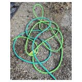 Two Shorter Pieces Of Hose