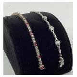 (2) sterling bracelets with stones. Total weight