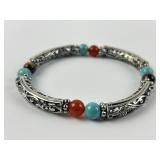 Womens Filigree Silver tone bracelet with blue and