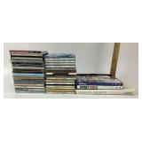 CDs Bruce Springsteen, Jimmy Buffett, DVDs, Books