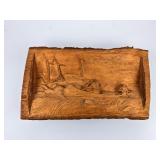 Handcarved log Native Americans in Canoe