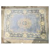 Large blue floral area rug