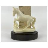 Anglo-Indian carved bone horse on horn base -