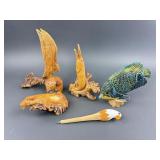 Carved burl wood snake, dolphin, eagle