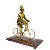 Brass Man in Top Hat on Bicycle Sculpture