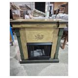 Fireplace Display With Painted Flowers On Front,