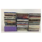 Music CDs Featuring Elvis Presley, Santana, Billy