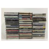 Music CDs Featuring Eagles, Adele, Clay Walker, Pa