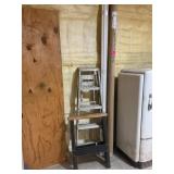 5 foot metal ladder, sawhorse, baseboard trim