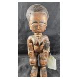 Wooden Figurine With Carved Details