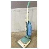 Blue MCM Hoover Vacuum - powers on