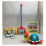 Fisher Price: Pop Up Pal, Melody Chime Roller, Tip