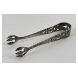 Sterling silver sugar tongs. 12.28 grams